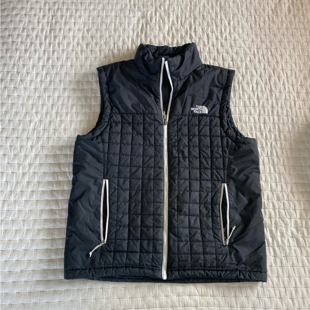 The Northface quilted puffer vest size L black